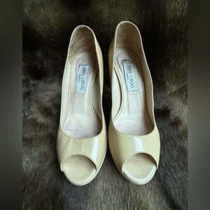 Jimmy Choo Peep Toe Platform
Heels- 36 1/2 EUR